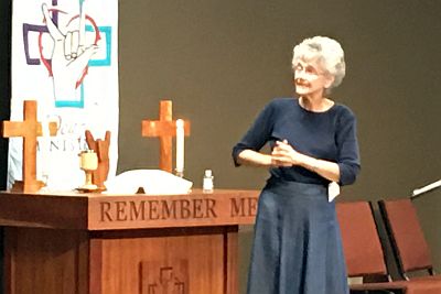 Bishop Peggy addresses the group