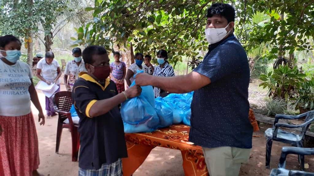 Distribution of dry rations to PWD